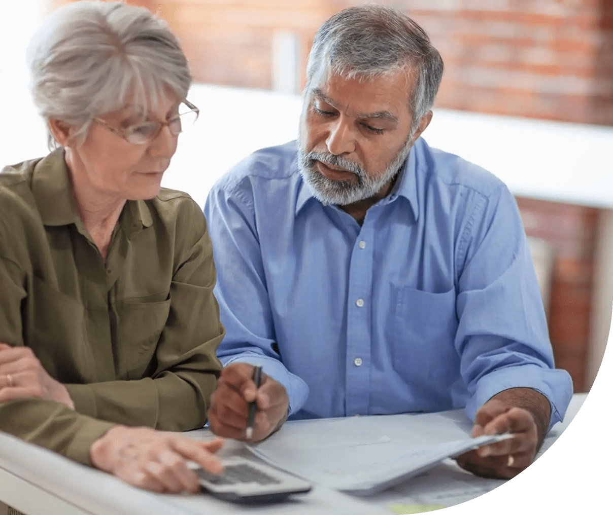 Senior couple discussing bills together