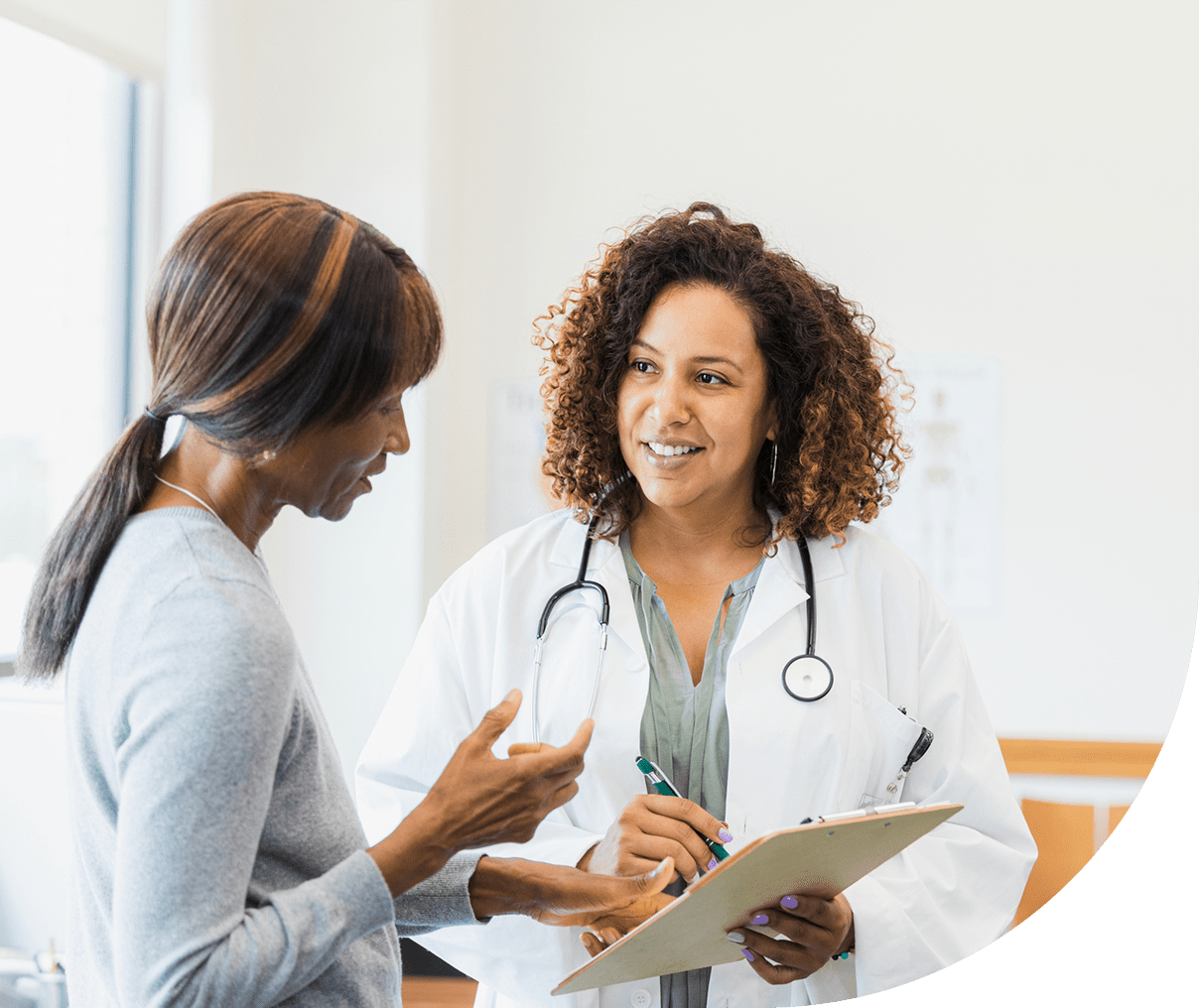 Doctor consulting with patient in office
