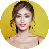 Woman smiling with yellow background
